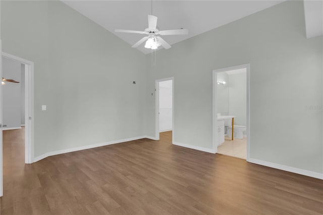 3507 Tenby Cir, Clermont, FL 34711 - empty room with high vaulted ceiling, ceiling fan, and wood finished floors