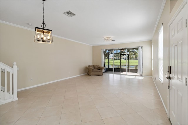 6059 Twain St Unit 108, Orlando, FL 32835 - entrance foyer featuring ornamental molding, light tile patterned flooring, and a chandelier