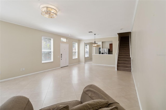 6059 Twain St Unit 108, Orlando, FL 32835 - foyer featuring stairway, crown molding, and light tile patterned flooring