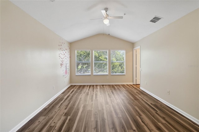 6059 Twain St Unit 108, Orlando, FL 32835 - spare room with a ceiling fan, wood finished floors, and lofted ceiling