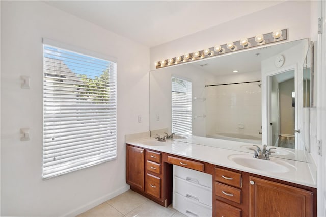 6059 Twain St Unit 108, Orlando, FL 32835 - bathroom with double vanity, bathtub / shower combination, and tile patterned floors