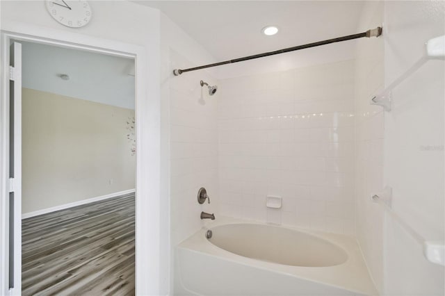 6059 Twain St Unit 108, Orlando, FL 32835 - bathroom with bathtub / shower combination, wood finished floors, and recessed lighting