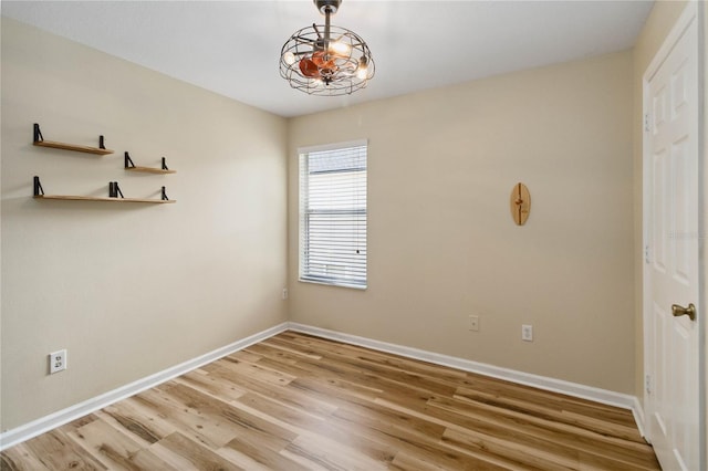6059 Twain St Unit 108, Orlando, FL 32835 - empty room featuring light wood-style floors and baseboards