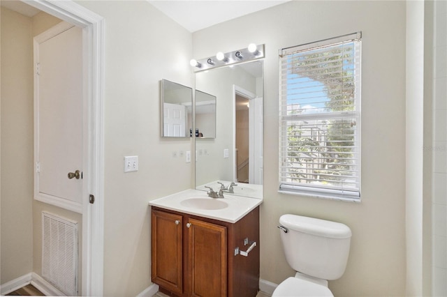 6059 Twain St Unit 108, Orlando, FL 32835 - bathroom featuring vanity and toilet