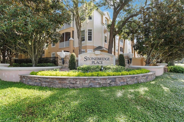 6059 Twain St Unit 108, Orlando, FL 32835 - community / neighborhood sign featuring a lawn