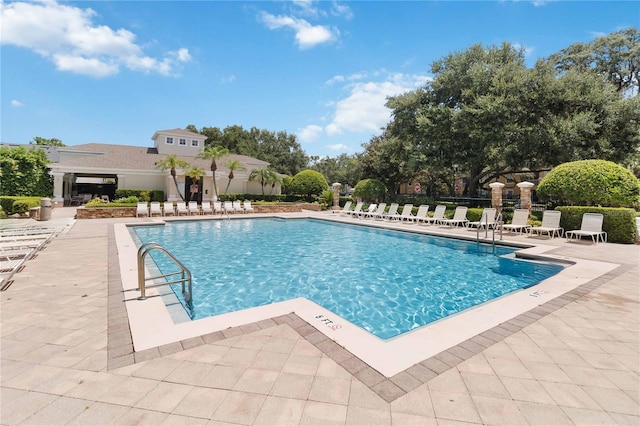 6059 Twain St Unit 108, Orlando, FL 32835 - community pool featuring a patio