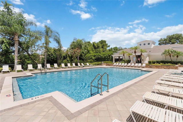6059 Twain St Unit 108, Orlando, FL 32835 - community pool featuring a patio
