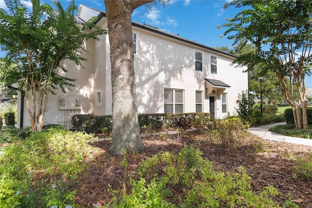 6059 Twain St Unit 108, Orlando, FL 32835 - view of front of home with stucco siding
