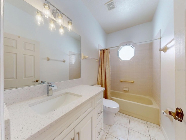 7985 Saint Giles Pl, Orlando, FL 32835 - bathroom with tile patterned flooring, vanity, and shower / tub combo with curtain