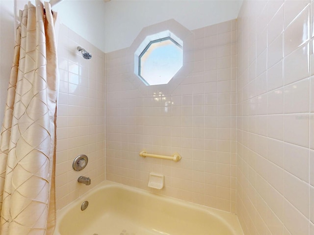 7985 Saint Giles Pl, Orlando, FL 32835 - full bathroom featuring shower / bath combo with shower curtain