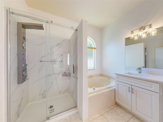 7985 Saint Giles Pl, Orlando, FL 32835 - bathroom with a bath, a marble finish shower, vanity, and tile patterned floors