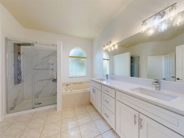 7985 Saint Giles Pl, Orlando, FL 32835 - bathroom featuring double vanity, a bath, a marble finish shower, and tile patterned floors