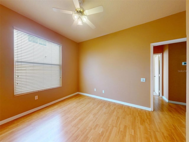 7985 Saint Giles Pl, Orlando, FL 32835 - unfurnished room featuring light wood finished floors and ceiling fan
