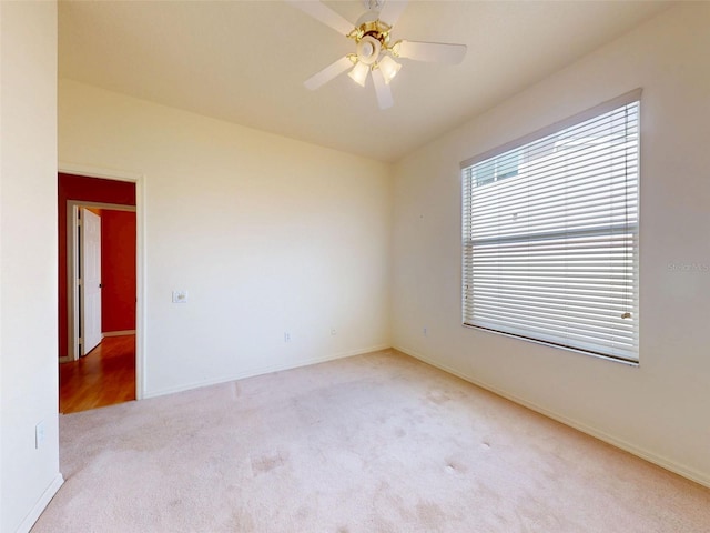 7985 Saint Giles Pl, Orlando, FL 32835 - spare room featuring carpet floors and a ceiling fan