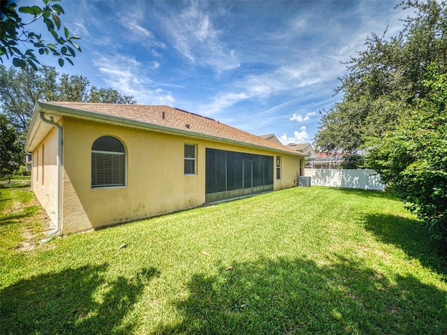 7985 Saint Giles Pl, Orlando, FL 32835 - back of house featuring stucco siding
