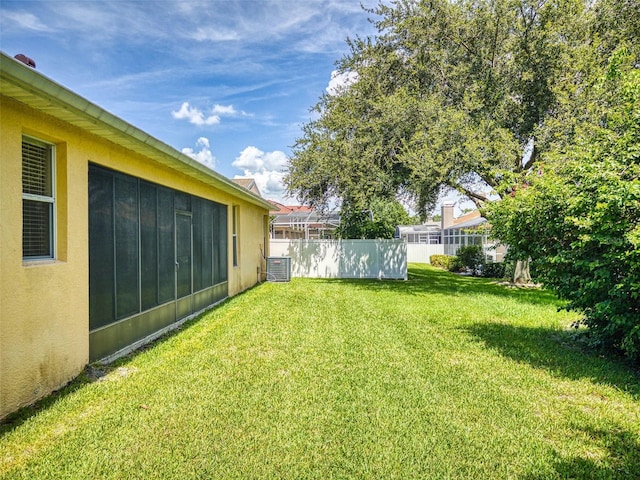 7985 Saint Giles Pl, Orlando, FL 32835 - view of yard with a sunroom