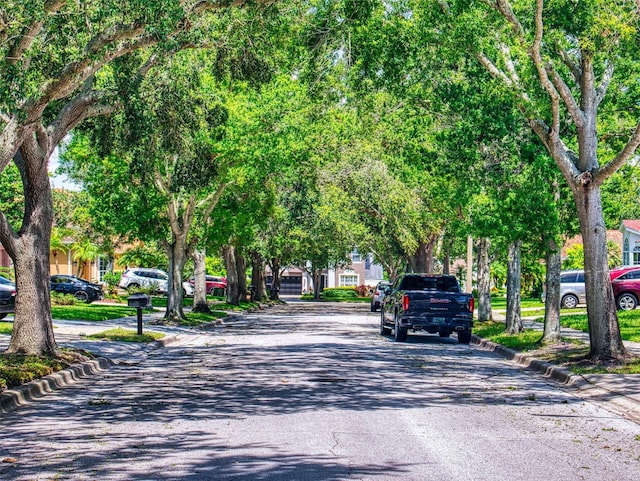 7985 Saint Giles Pl, Orlando, FL 32835 - view of asphalt street featuring curbs