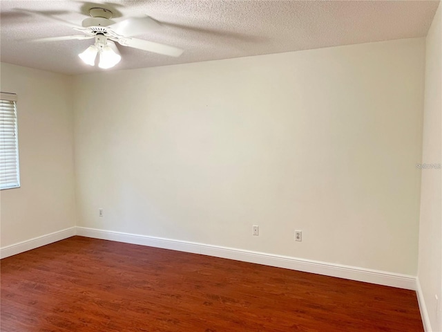957 Southridge Trl, Altamonte Springs, FL 32714 - unfurnished room with dark wood-style flooring, ceiling fan, and a textured ceiling