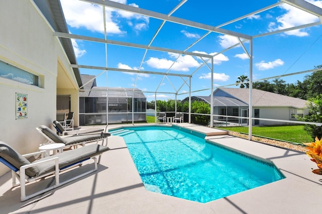 1520 Gulf Vue Dr, Haines City, FL 33844 - swimming pool with a patio, glass enclosure, and a yard