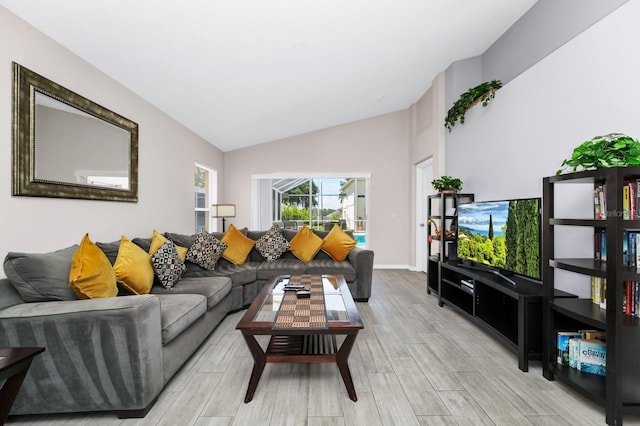 1520 Gulf Vue Dr, Haines City, FL 33844 - living area with light wood finished floors and lofted ceiling