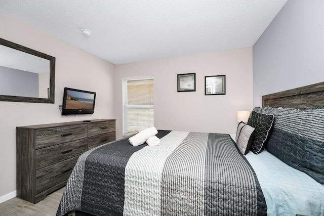 1520 Gulf Vue Dr, Haines City, FL 33844 - bedroom featuring light wood-style flooring