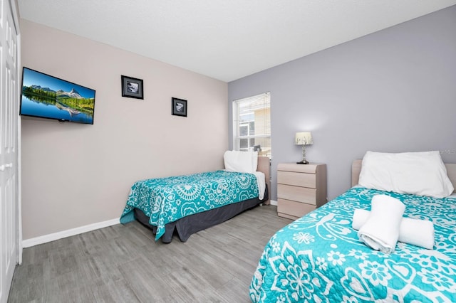 1520 Gulf Vue Dr, Haines City, FL 33844 - bedroom with wood finished floors and baseboards