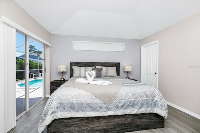 1520 Gulf Vue Dr, Haines City, FL 33844 - bedroom with wood finished floors and access to outside