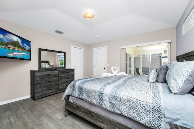 1520 Gulf Vue Dr, Haines City, FL 33844 - bedroom featuring wood finished floors and baseboards