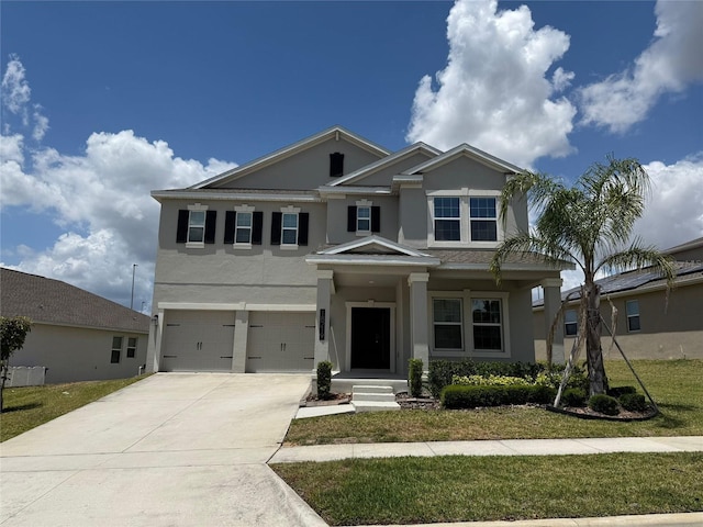 18219 Oliver Twist Way, Winter Garden, FL 34787 - view of front of home with stucco siding, an attached garage, concrete driveway, and a front yard