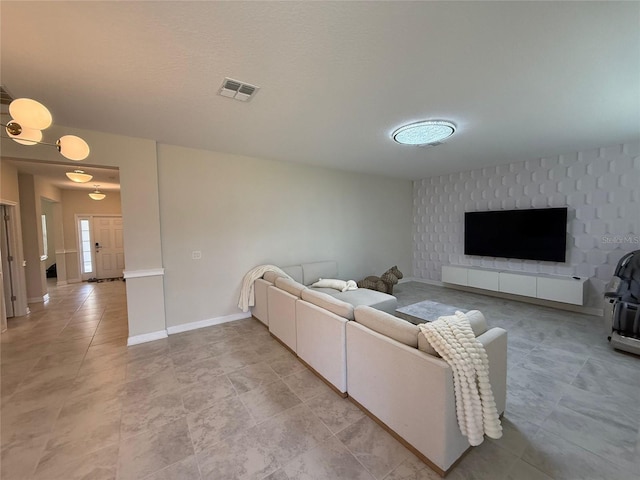 18219 Oliver Twist Way, Winter Garden, FL 34787 - living room with baseboards and light tile patterned flooring