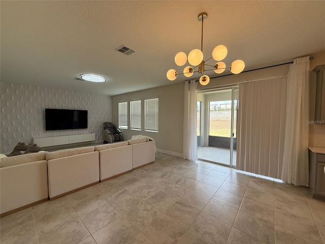 18219 Oliver Twist Way, Winter Garden, FL 34787 - living area featuring healthy amount of natural light, a chandelier, light tile patterned flooring, and a textured ceiling