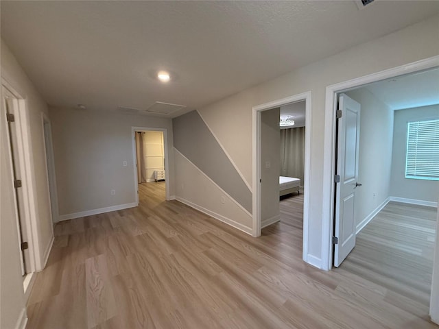 18219 Oliver Twist Way, Winter Garden, FL 34787 - unfurnished room with light wood-style floors and baseboards