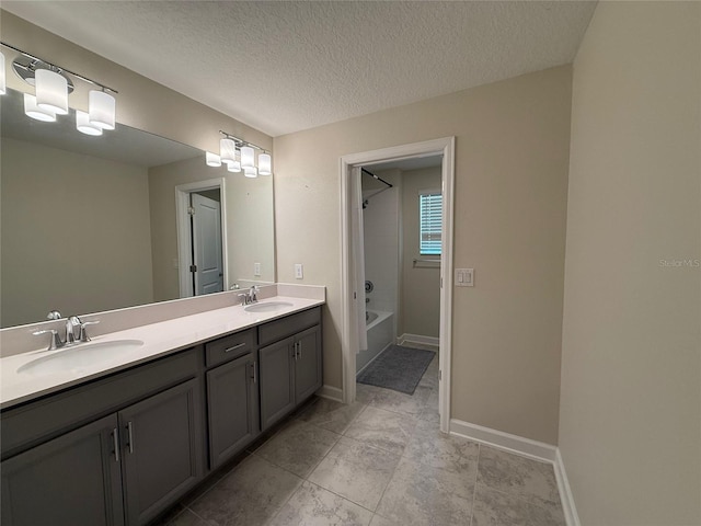 18219 Oliver Twist Way, Winter Garden, FL 34787 - full bath with double vanity, shower / bath combination, and a textured ceiling