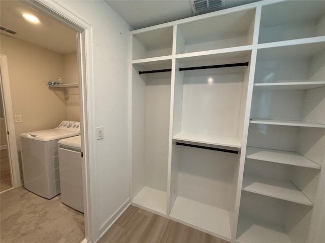 18219 Oliver Twist Way, Winter Garden, FL 34787 - closet featuring washer and clothes dryer