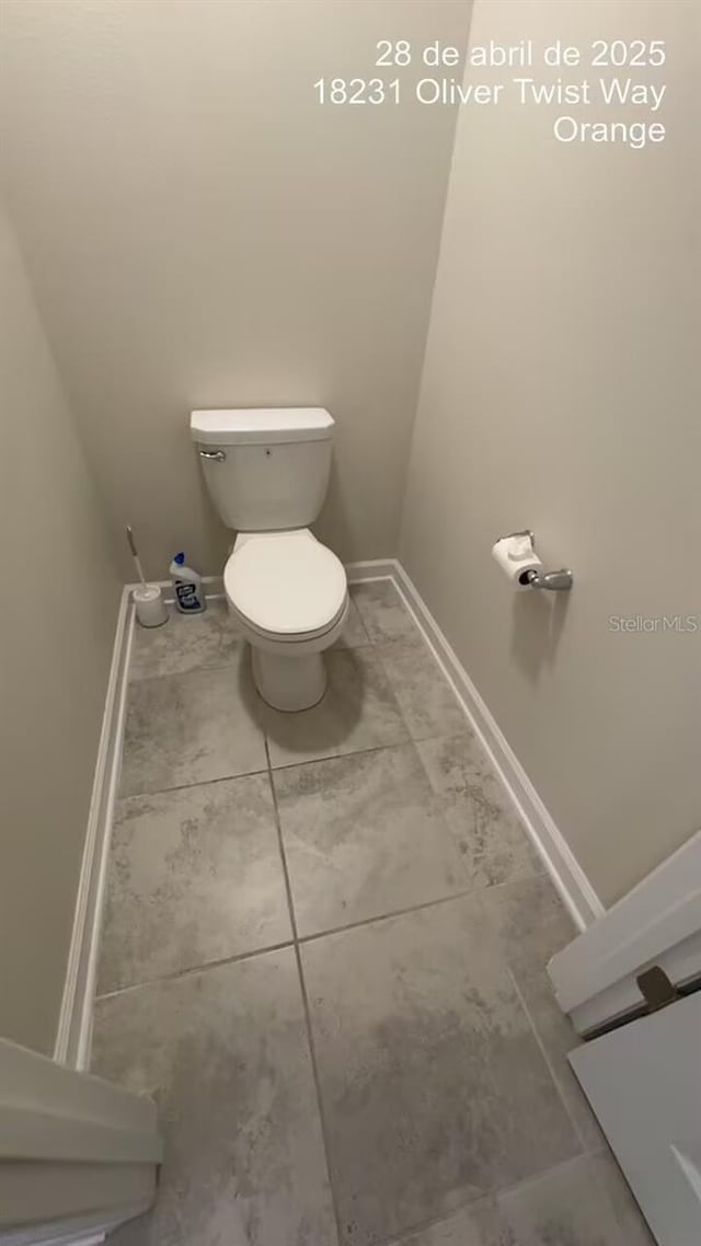 18219 Oliver Twist Way, Winter Garden, FL 34787 - bathroom featuring baseboards