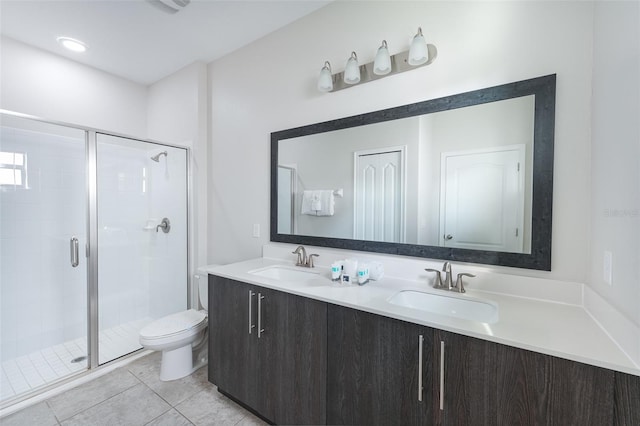 207 Macaulays Cv, Haines City, FL 33844 - full bath featuring double vanity, a stall shower, and tile patterned flooring