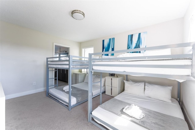 207 Macaulays Cv, Haines City, FL 33844 - bedroom with carpet and baseboards
