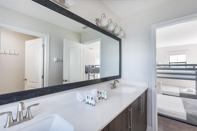 207 Macaulays Cv, Haines City, FL 33844 - ensuite bathroom featuring double vanity