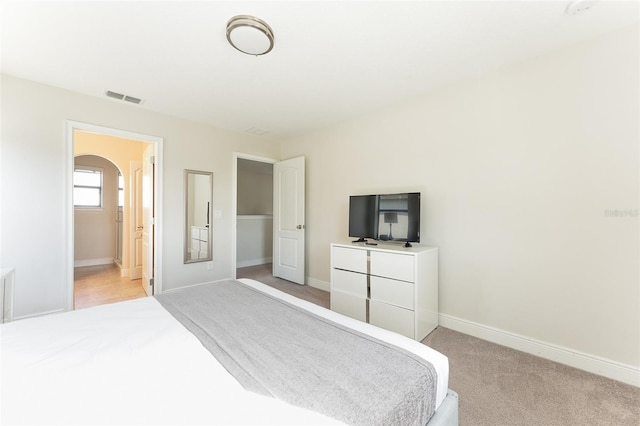 207 Macaulays Cv, Haines City, FL 33844 - bedroom featuring light colored carpet