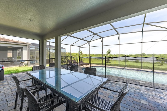 207 Macaulays Cv, Haines City, FL 33844 - view of patio / terrace featuring an outdoor pool and a lanai