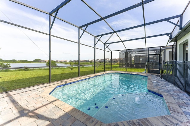 207 Macaulays Cv, Haines City, FL 33844 - outdoor pool with a water view, a yard, a patio, and a lanai