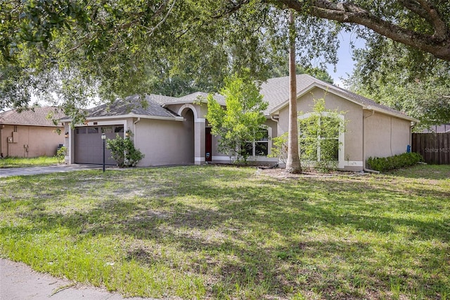 3245 Kings Ridge Ter, Deltona, FL 32725 - ranch-style house with stucco siding, a garage, and driveway