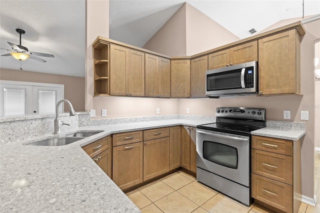 3245 Kings Ridge Ter, Deltona, FL 32725 - kitchen with appliances with stainless steel finishes, a ceiling fan, open shelves, lofted ceiling, and light tile patterned flooring