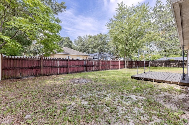 3245 Kings Ridge Ter, Deltona, FL 32725 - fenced backyard featuring a deck
