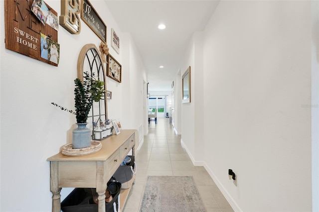 9370 Westmorely St, Groveland, FL 34736 - hallway featuring light tile patterned flooring and recessed lighting