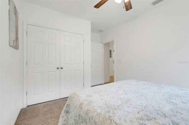 9370 Westmorely St, Groveland, FL 34736 - bedroom with carpet, a closet, and a ceiling fan