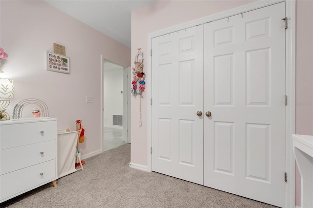 9370 Westmorely St, Groveland, FL 34736 - bedroom featuring light colored carpet and a closet