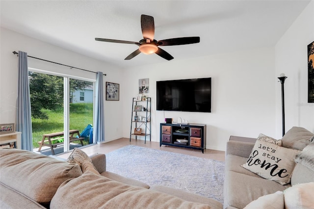 9370 Westmorely St, Groveland, FL 34736 - living area featuring ceiling fan and tile patterned floors