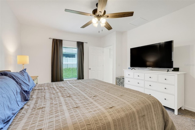 9370 Westmorely St, Groveland, FL 34736 - bedroom with light colored carpet and a ceiling fan