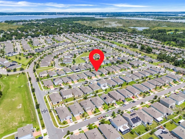9370 Westmorely St, Groveland, FL 34736 - aerial overview of property's location with a large body of water and nearby suburban area